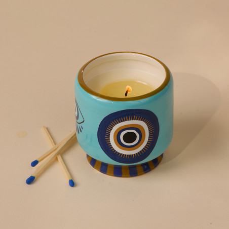 Bougie Parfumée Eye - Encens et Fumée signé Paddywax. Le bleu et doré de la Collection Adopo