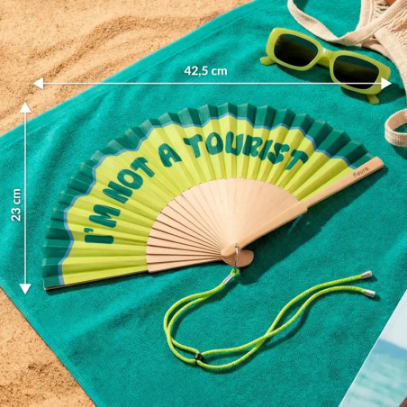 Éventail Fisura " I'M NOT A TOURISTE" pliable pour homme et femme, idéal contre la chaleur.
