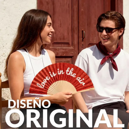 Éventail Fisura "LOVE IN THE AIR" pailleté rouge, accessoire tendance pour l'été et les festivals.