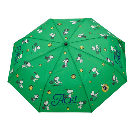 Service gagnant pour Snoopy avec le modèle Ace vert, le parapluie idéal des amateurs de tennis.
