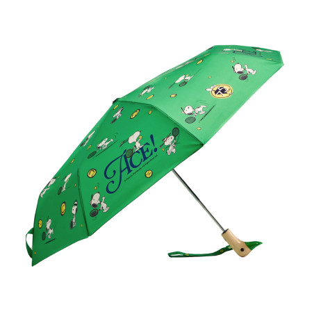 Service gagnant pour Snoopy avec le modèle Ace vert, le parapluie idéal des amateurs de tennis.