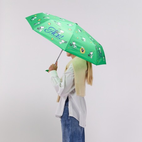 Service gagnant pour Snoopy avec le modèle Ace vert, le parapluie idéal des amateurs de tennis.