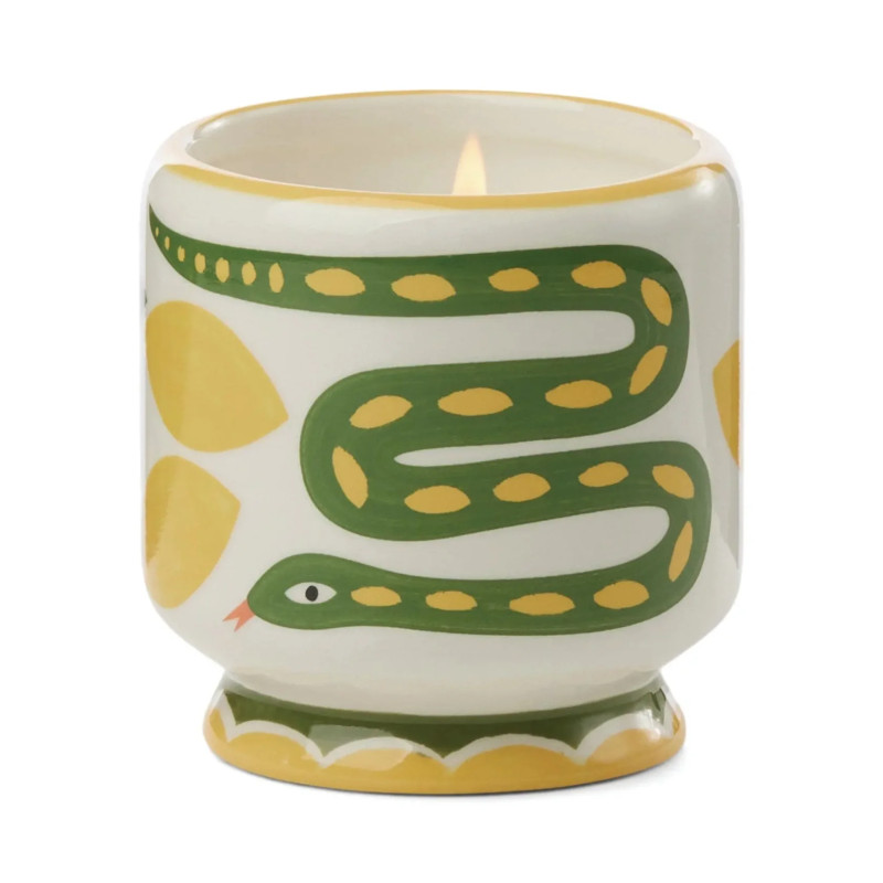 Bougie A Dopo Paddywax Wild Lemongrass avec motif serpent en céramique colorée.