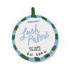 Bougie A Dopo Lush Palms Paddywax décorée de palmiers et présentée dans un pot en céramique.