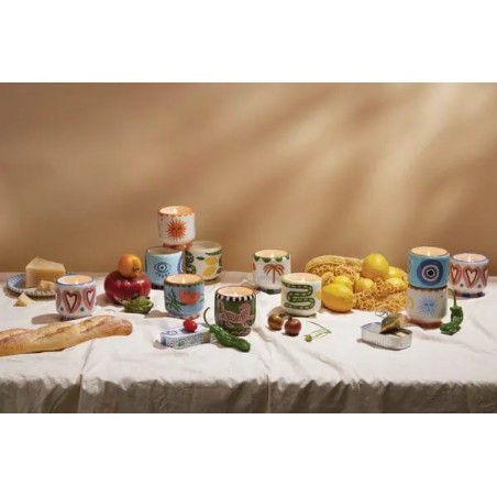 Collection complète des bougies A Dopo Paddywax : 12 parfums et 12 motifs en céramique colorée.