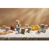 Collection complète des bougies A Dopo Paddywax : 12 parfums et 12 motifs en céramique colorée.