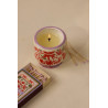 Bougie A Dopo Coconut & Amber Paddywax avec motif singe et décor jungle en céramique.