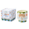 Bougie A Dopo Lush Palms Paddywax décorée de palmiers et présentée dans un pot en céramique