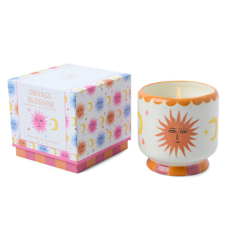Bougie parfumée Orange Blossom A Dopo Paddywax avec décor soleil coloré en céramique.