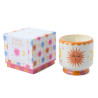 Bougie parfumée Orange Blossom A Dopo Paddywax avec décor soleil coloré en céramique.