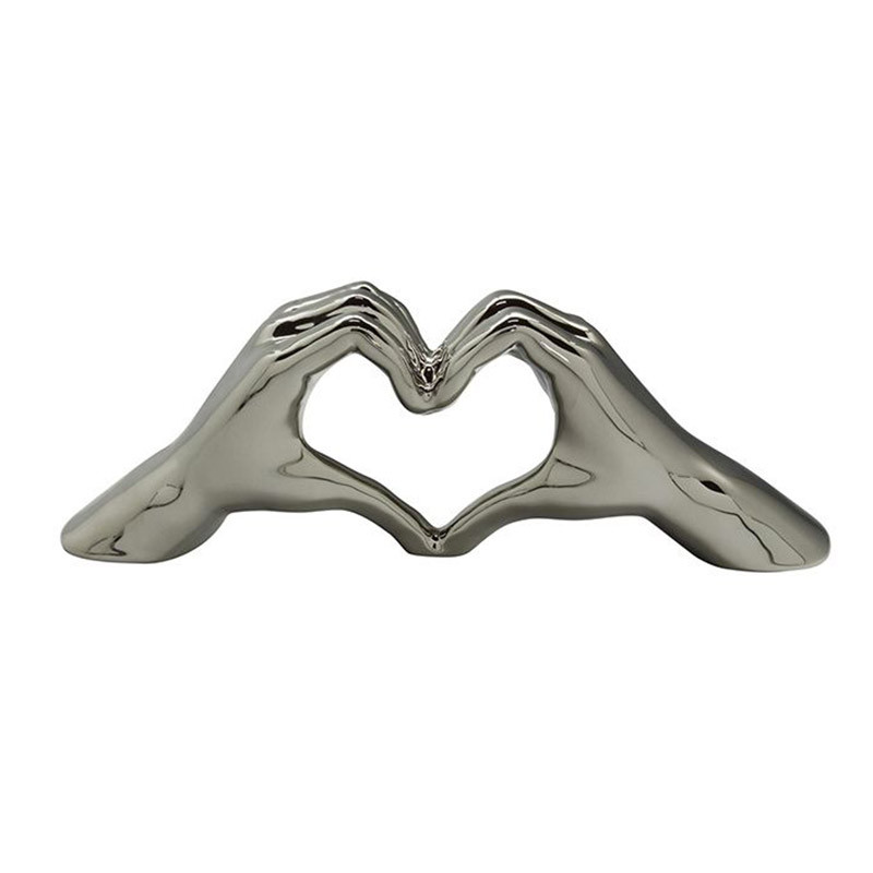 Statue Geste Main Cœur Chrome